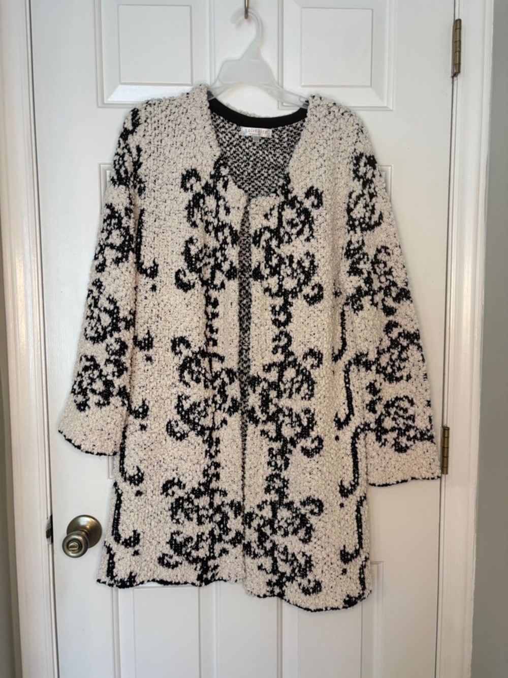 Solitaire by RAVENKOSLA Black & Cream Bouclé Sweater